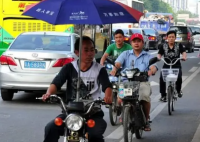 广州拟推出电动自行车限行政策 谁具有优先路权?